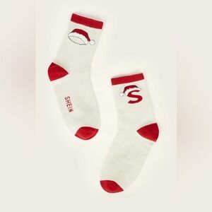 New unopened "S" Santa red and white crew length socks